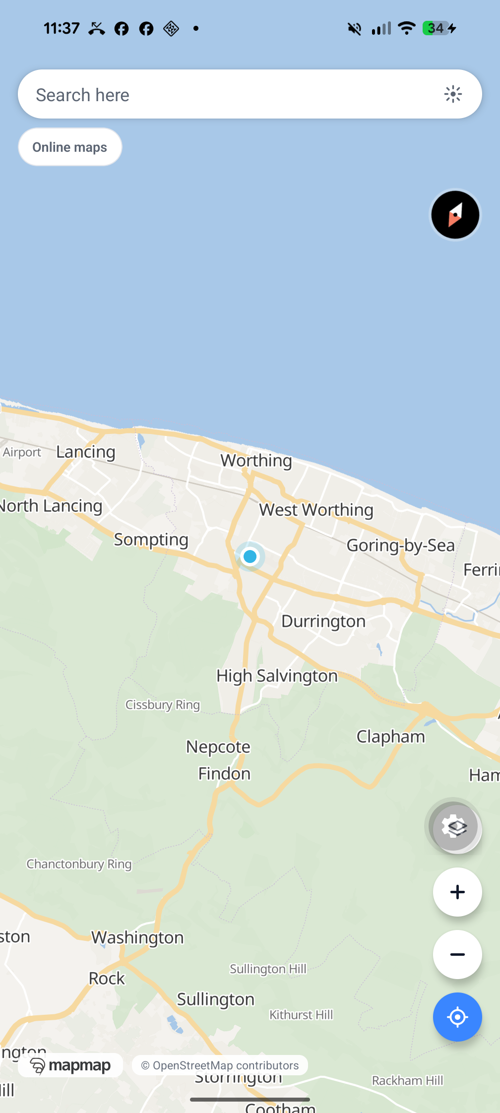 On-map zoom, layers, compass and locate controls over the South Downs near Worthing, West Sussex, rendered by MapMap Nav