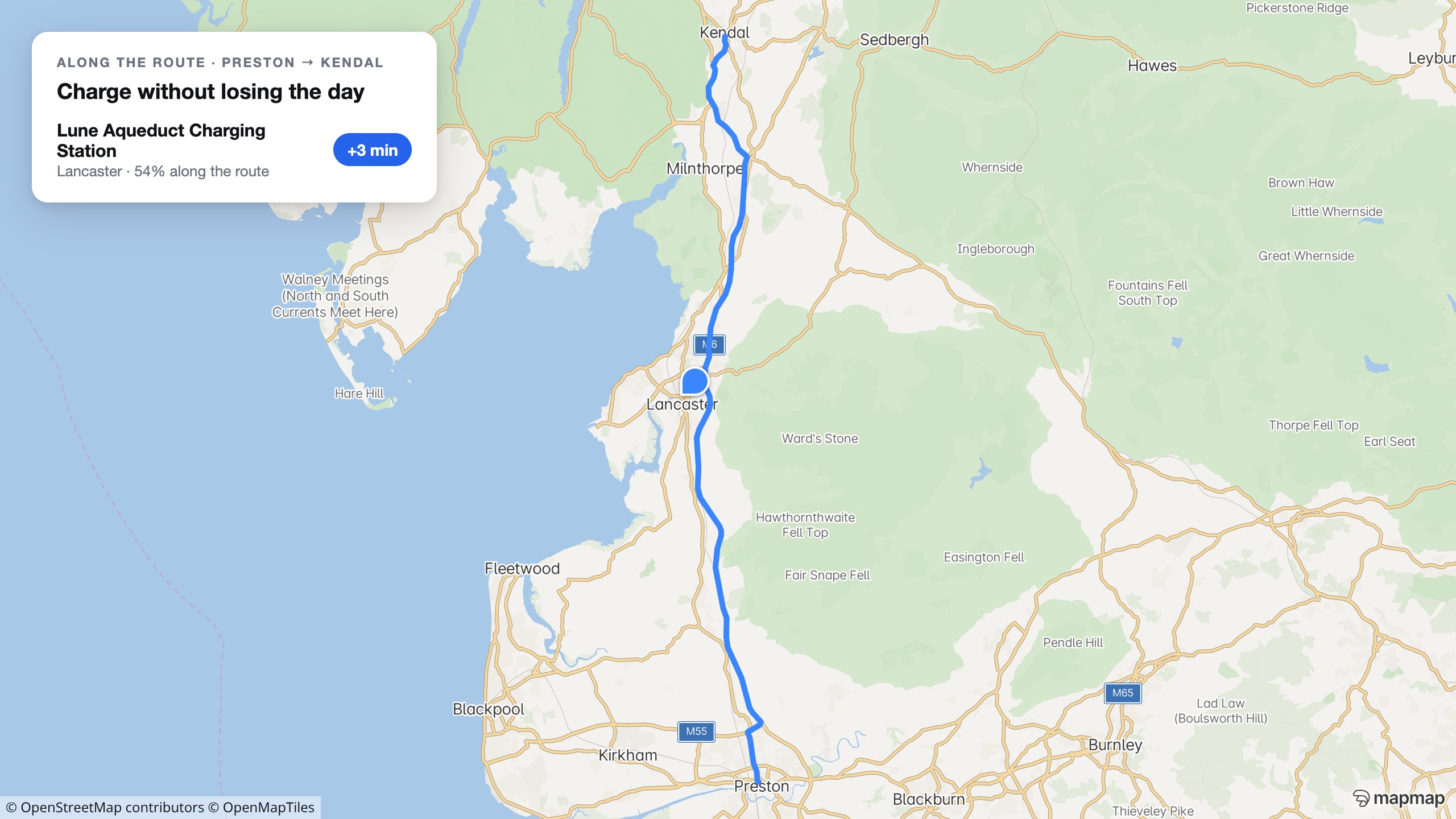 A real MapMap route from Preston to Kendal with a charging station marked near Lancaster and a card showing its genuine detour cost of three minutes