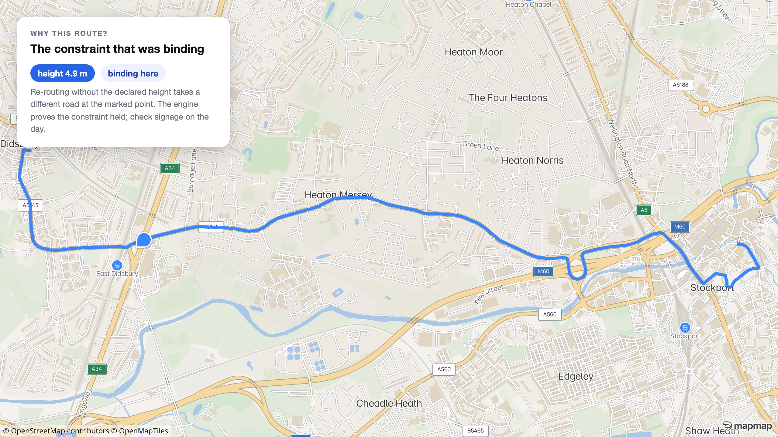 A real truck route near Manchester with a marker where a declared 4.9 m height constraint was binding, and a card explaining the rationale