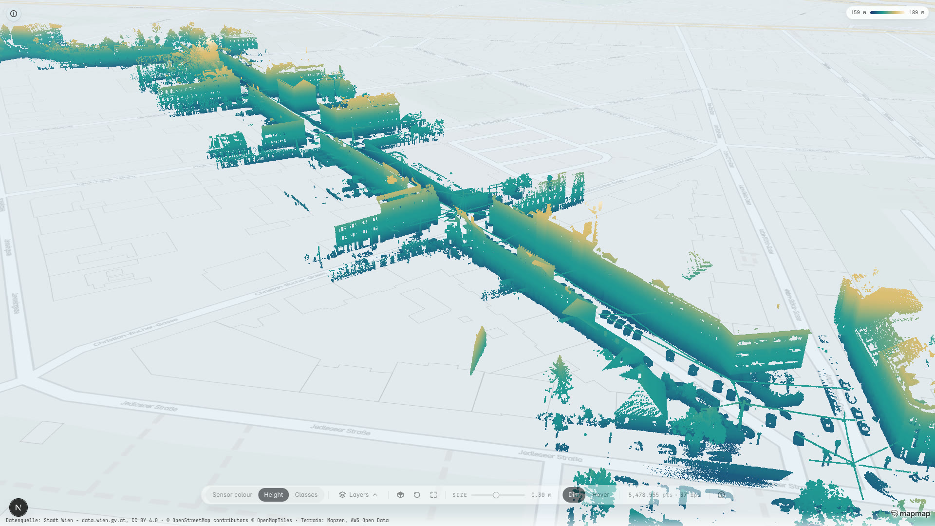 The MapMap lidar viewer orbiting 5.5 million points of Schillgasse, Vienna: street facades, parked cars and trees coloured by height from teal at street level to gold on the rooftops, with the viewer's own controls and the City of Vienna open-data credit on the canvas